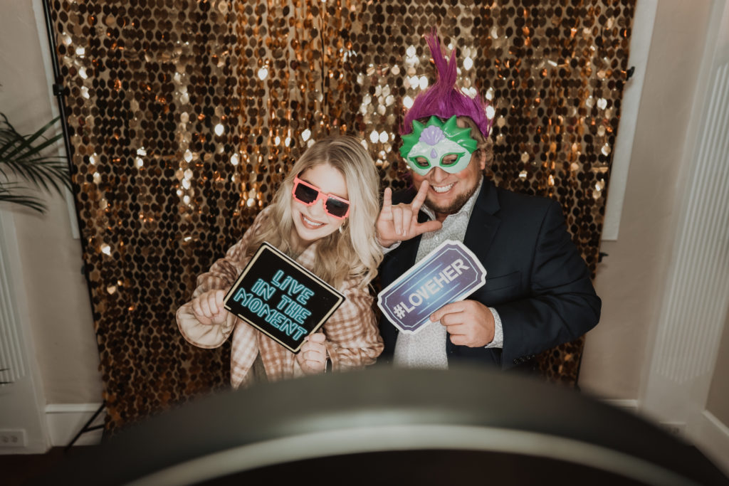 couple at wedding photo booth