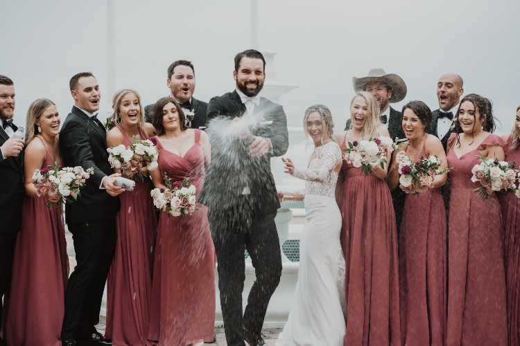 Groom opening campaign with bridal party